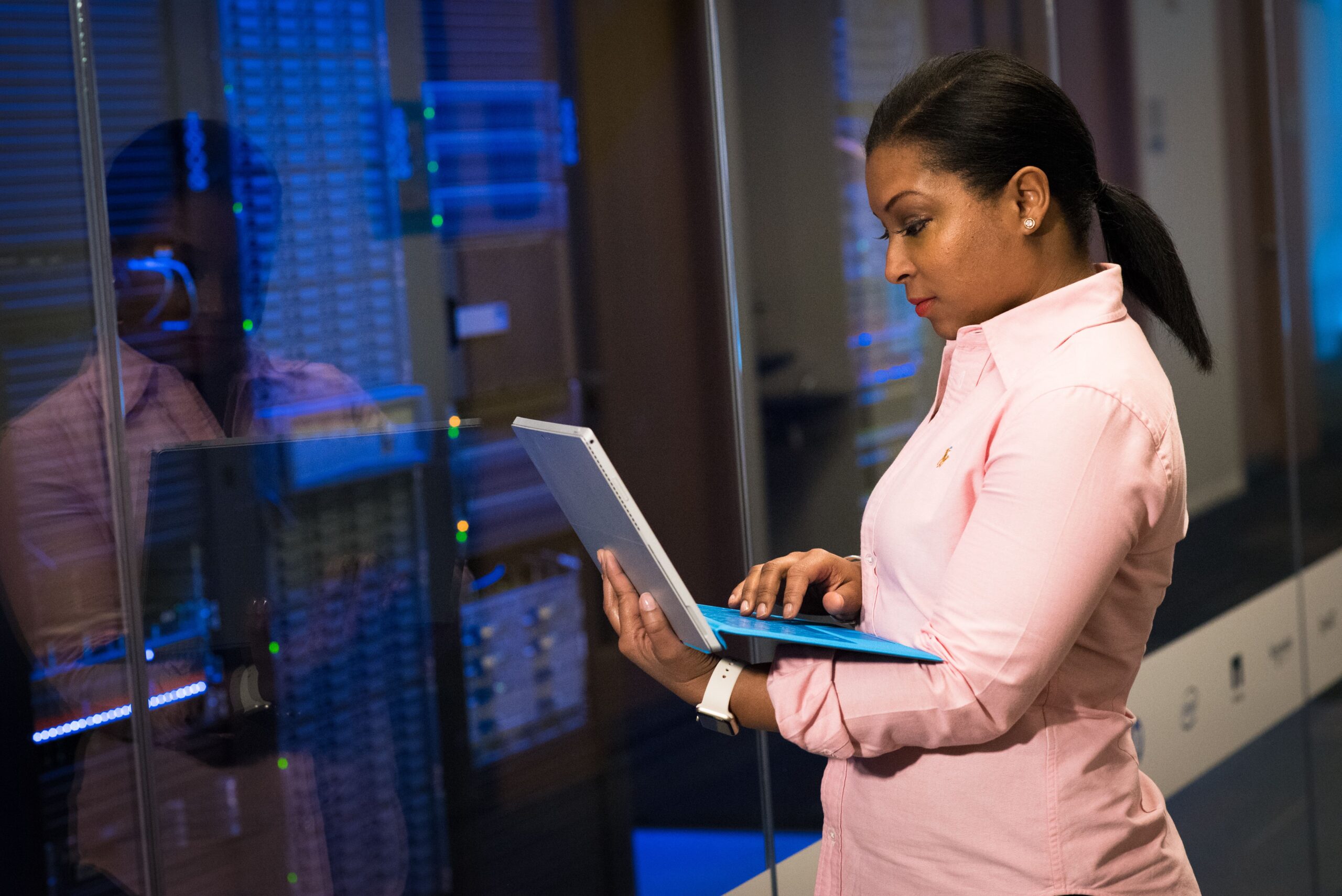 Business professional managing network infrastructure and researching funding for cybersecurity companies.